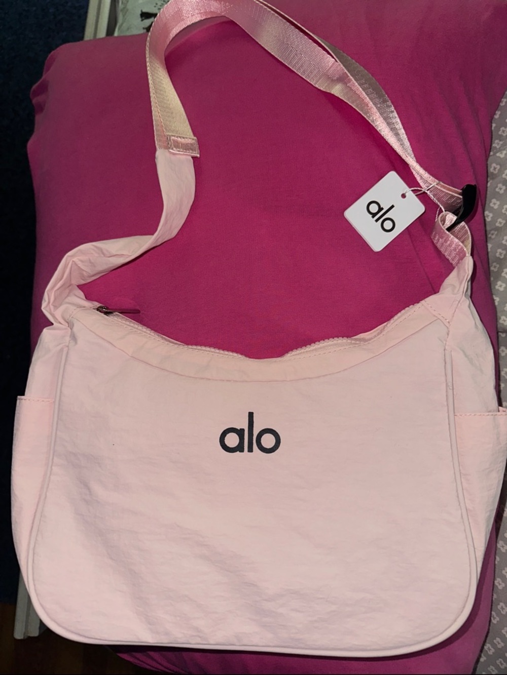 ALO Yoga Light Pink Crossbody Bag with Black Logo